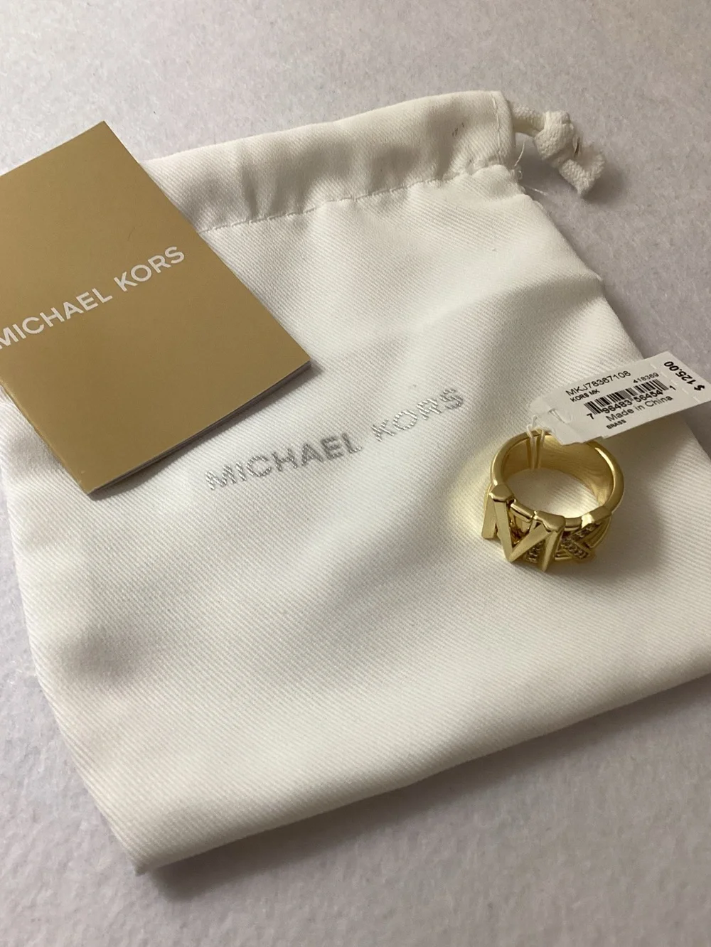 Michael Kors Faceted Mk Band Ring 14K Gold Plated Brass with Clear Stones